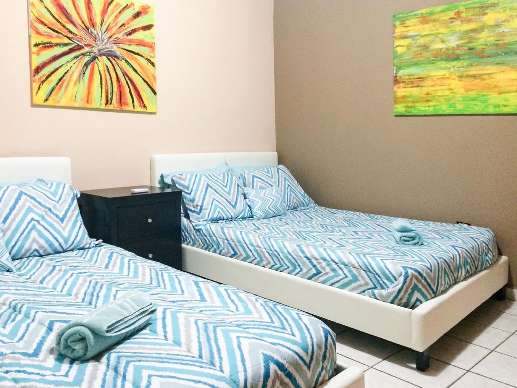 Coastal Express Inn & Suites #1 At 681 Ocean Drive Islote Quarto foto